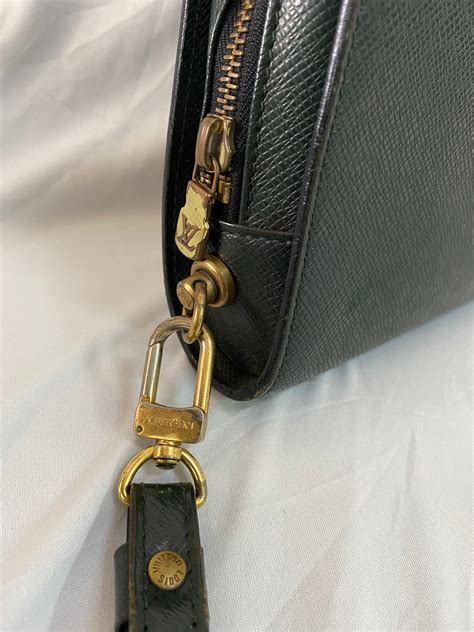 lv taiga clutch|Louis Vuitton Pre.